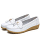 Women's slip-on loafers with tassel and metal details