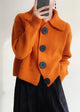 Women's ribbed knit cardigan with Peter Pan collar and large front buttons