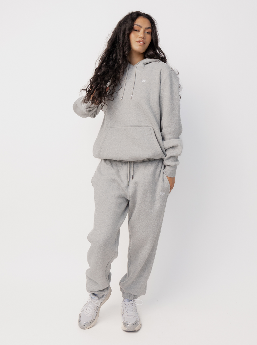 Women's grey logo jogger trousers with drawstring waist and cuffed ankles