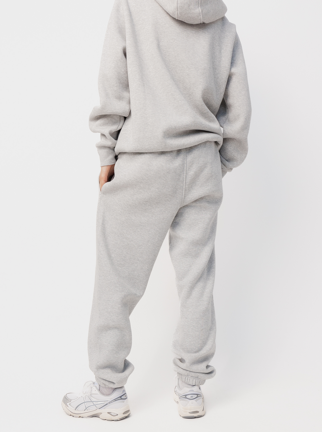 Women's grey logo jogger trousers with drawstring waist and cuffed ankles