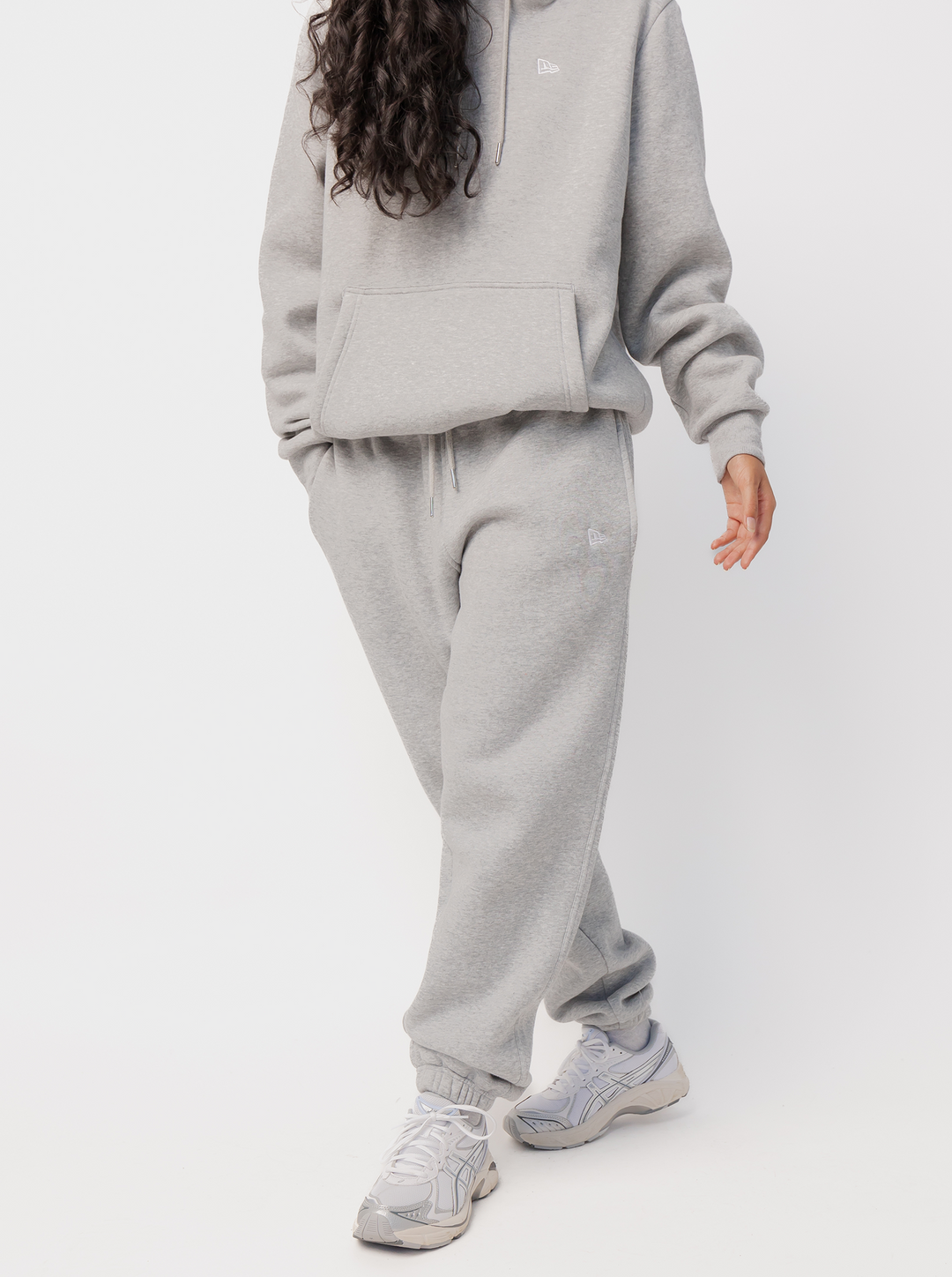 Women's grey logo jogger trousers with drawstring waist and cuffed ankles