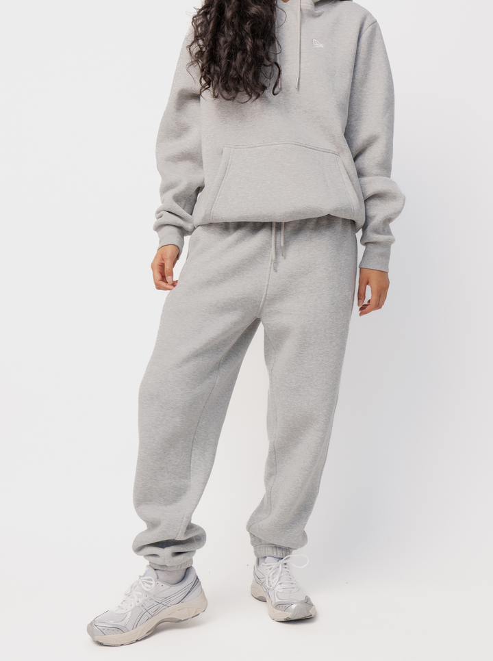 Women's grey logo jogger trousers with drawstring waist and cuffed ankles
