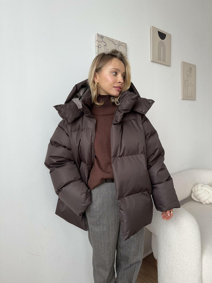 Women's oversized hooded puffer jacket with quilted panels