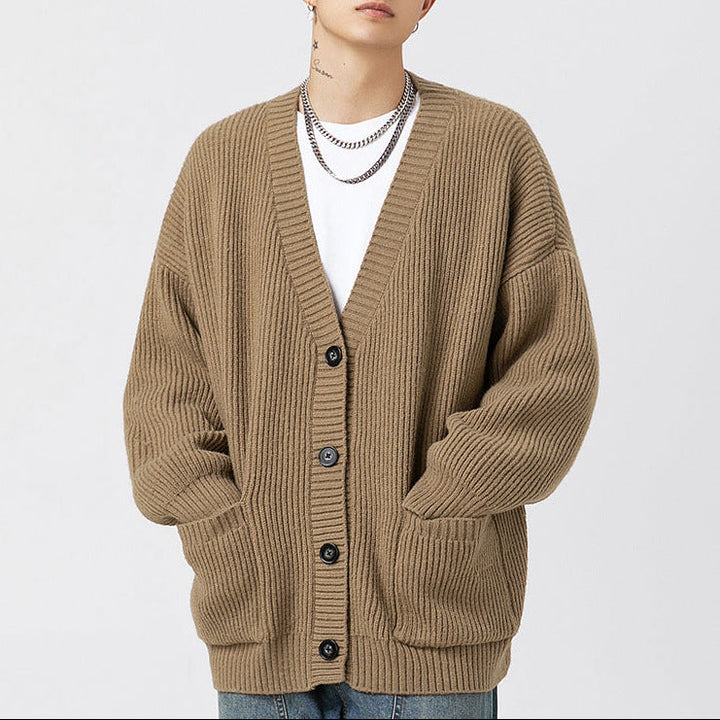 Women's oversized ribbed knit cardigan with V-neck, buttons and front pockets