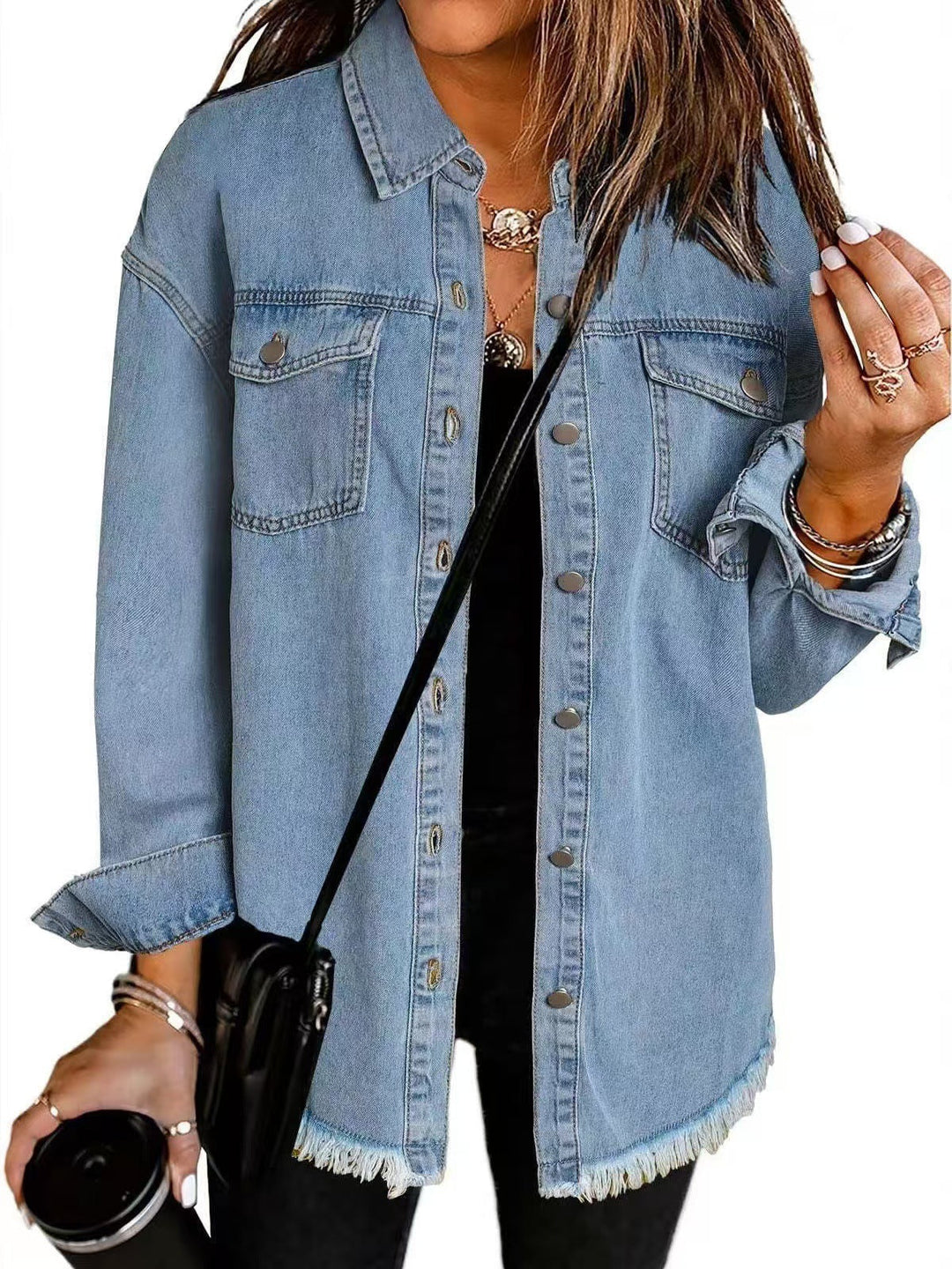 Women's denim jacket with chest pockets and frayed hem
