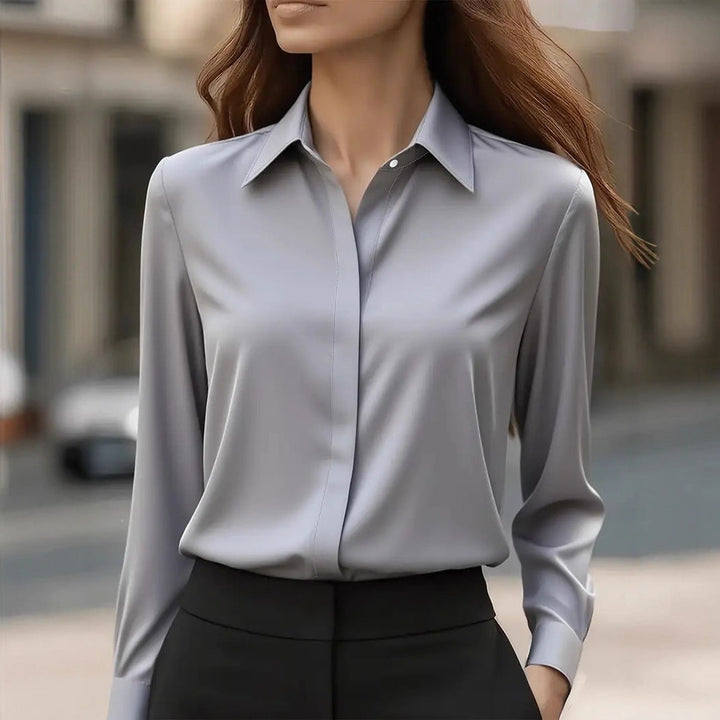 Women's long sleeve blouse with pointed collar and button front