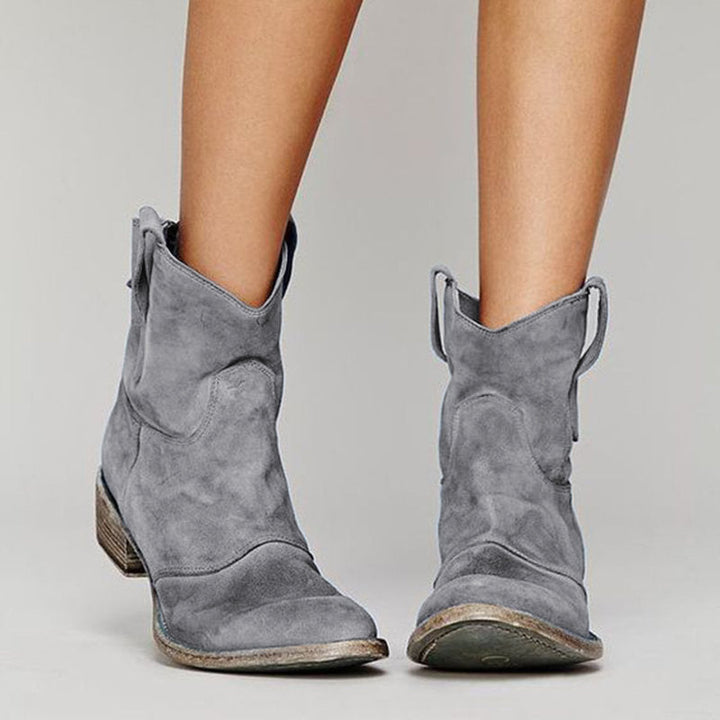 Women's suede western ankle boots with pull-on tabs and low heels