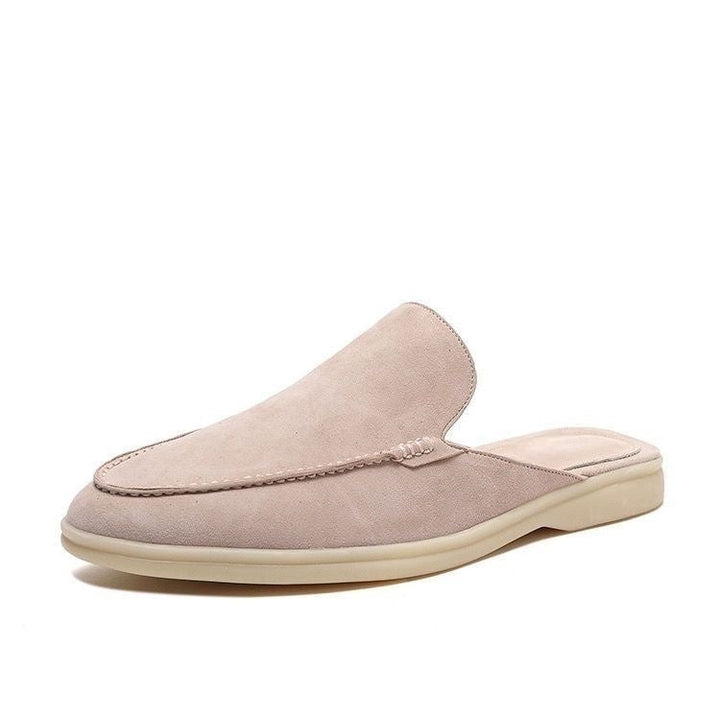 Black loafer mule with cream platform sole, open heel slip-on design