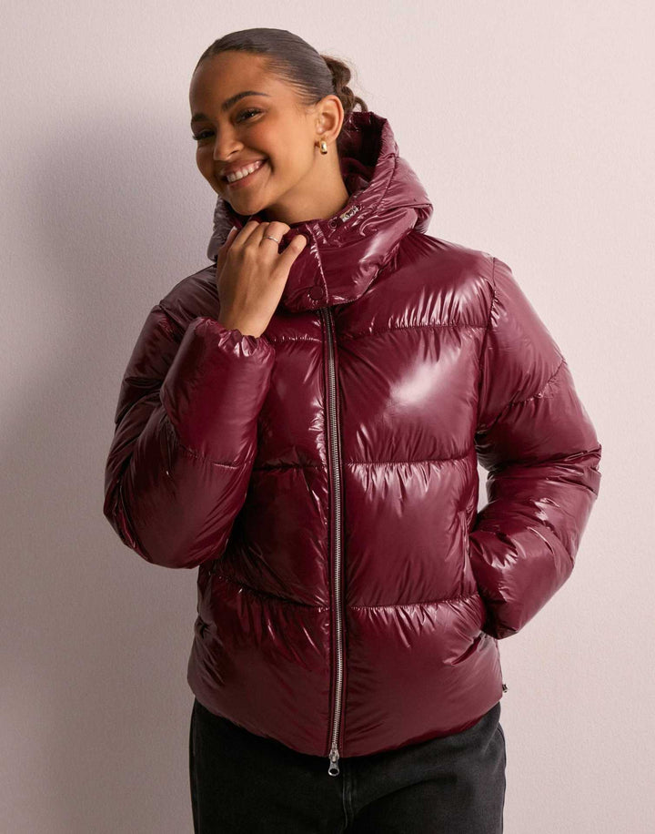 Women's glossy quilted puffer jacket with removable hood