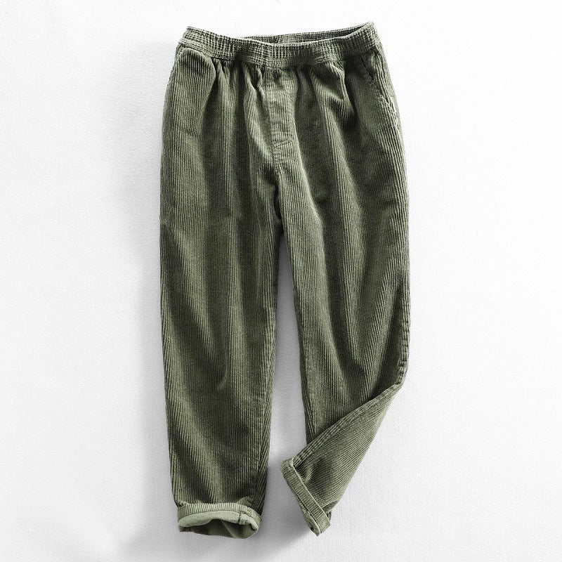 Men's ribbed corduroy pants with tapered legs and cuffed hems