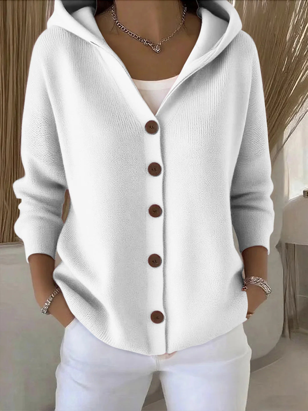 Women's hooded button cardigan with long sleeves and contrast buttons