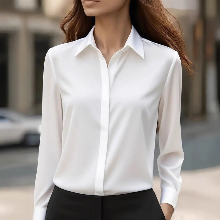 Women's long sleeve blouse with pointed collar and button front