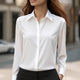 Women's long sleeve blouse with pointed collar and button front