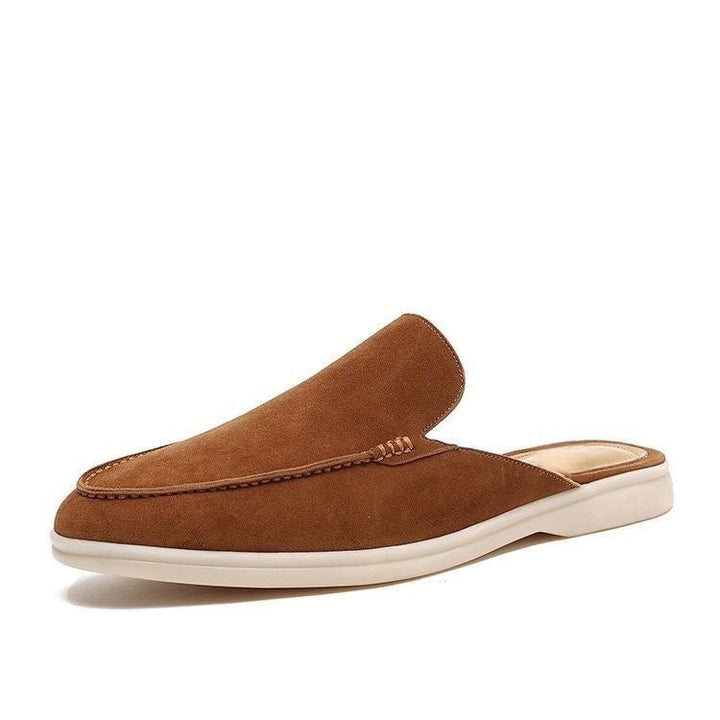 Black loafer mule with cream platform sole, open heel slip-on design