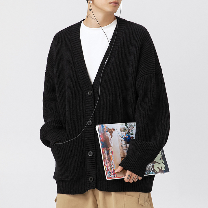 Women's oversized ribbed knit cardigan with V-neck, buttons and front pockets