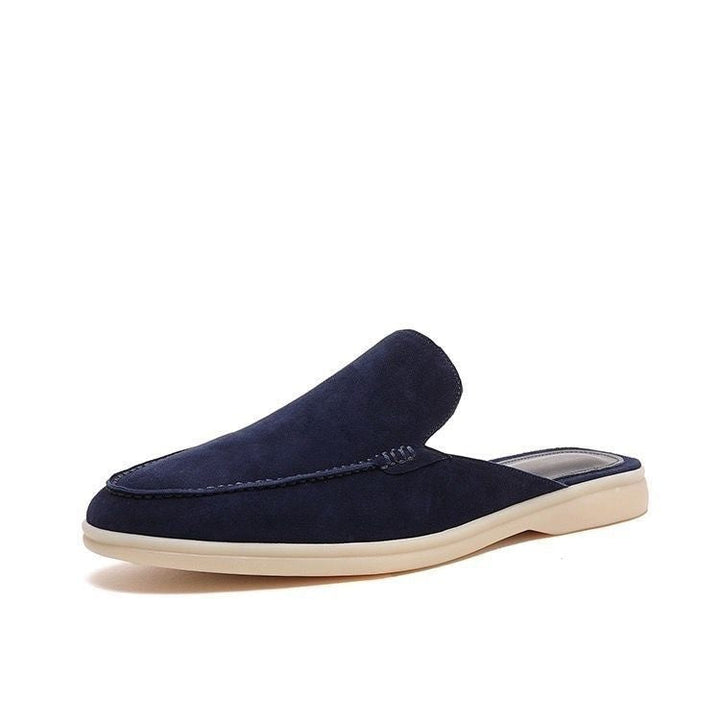 Black loafer mule with cream platform sole, open heel slip-on design