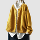 Women's textured knit cardigan with button front and patch pockets