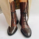 Women's lace-up boots with tall shafts, cap toe panels and low heels