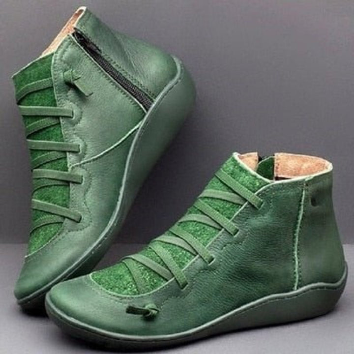 Women's ankle boots with lace-up fronts, side zips and rounded toes