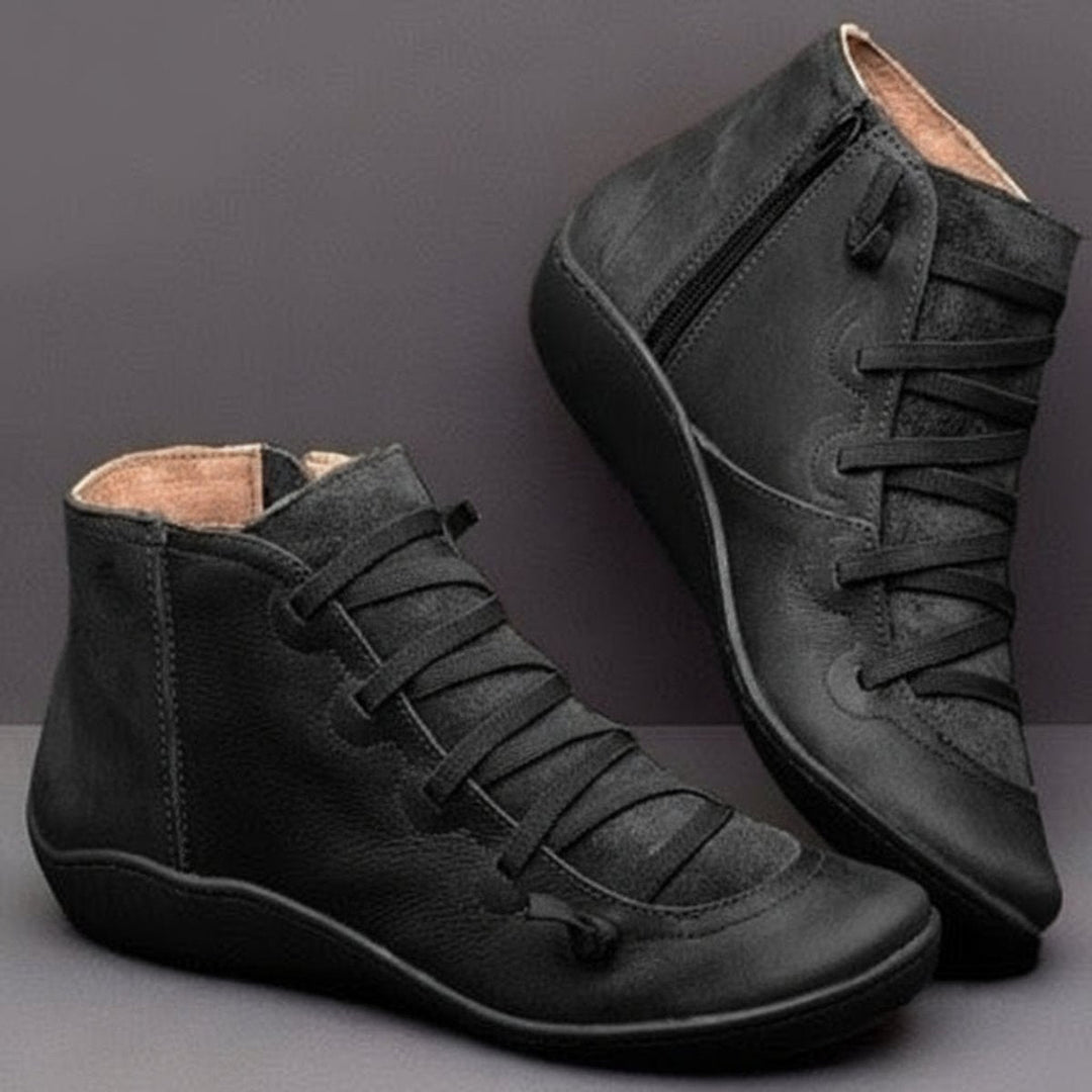 Women's ankle boots with lace-up fronts, side zips and rounded toes