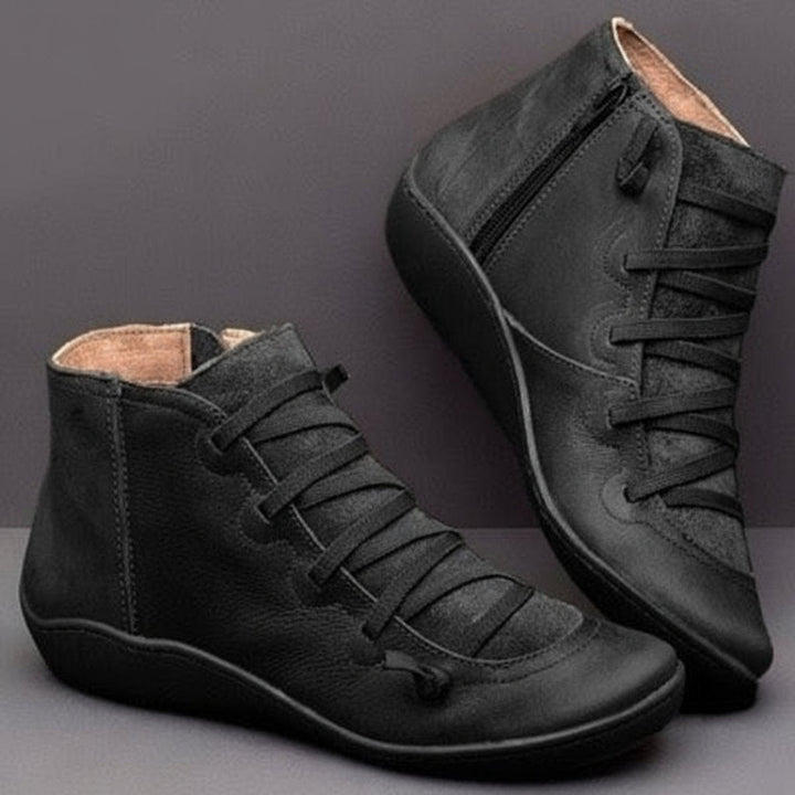 Women's ankle boots with lace-up fronts, side zips and rounded toes