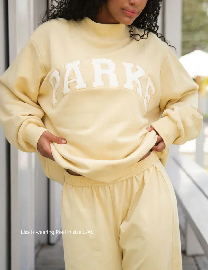 Women's oversized hoodie sweatshirt with chenille front lettering