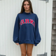 Women's oversized hoodie sweatshirt with chenille front lettering