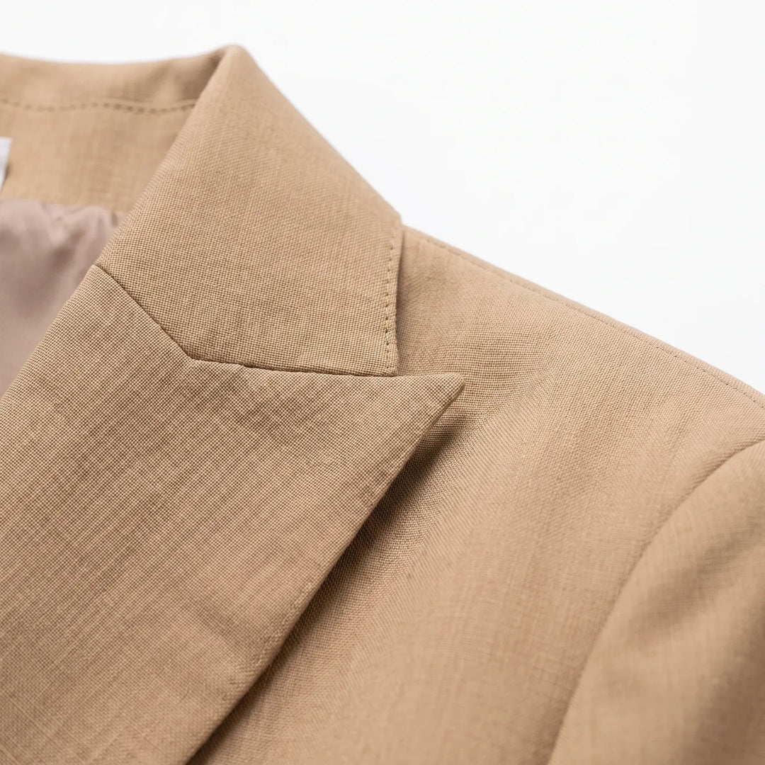 Women's tan double-breasted trouser suit with wide-leg trousers