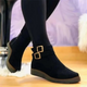Women's ankle boots with double buckle straps and flat sole