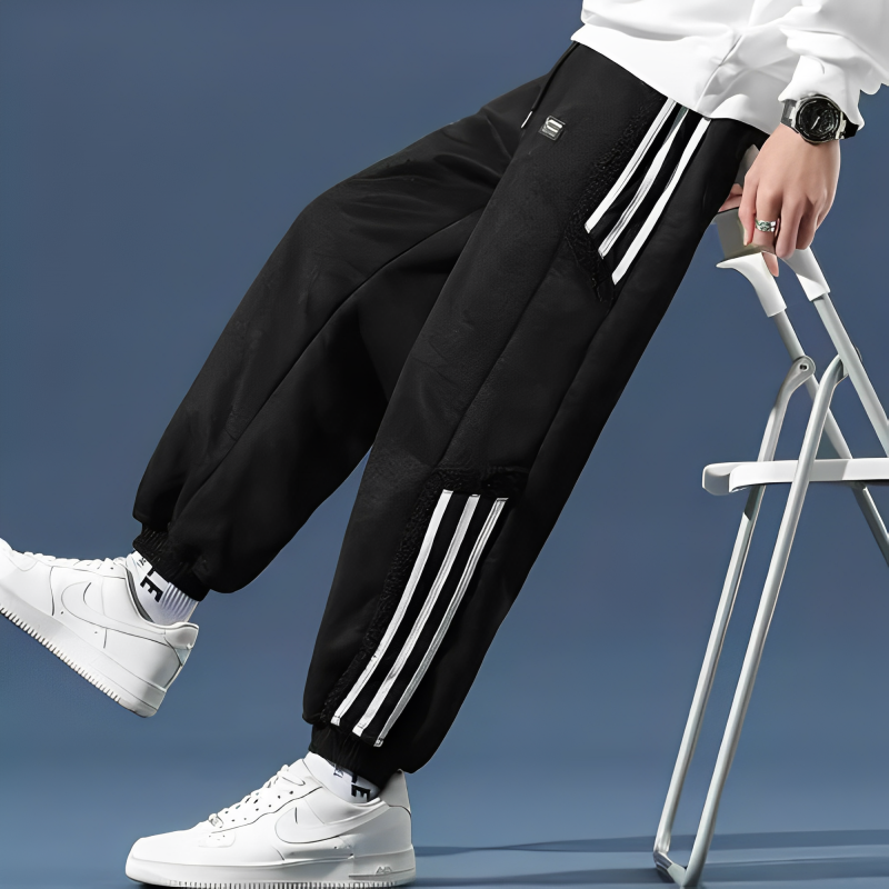 Men's jogger pants with contrasting side stripes and elastic cuffs