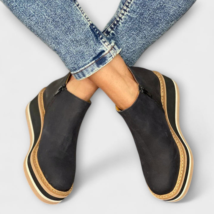 Chelsea ankle boots with side zip and layered platform sole