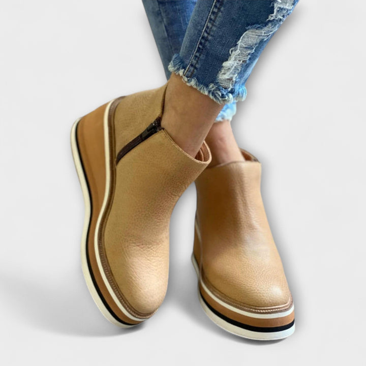 Chelsea ankle boots with side zip and layered platform sole