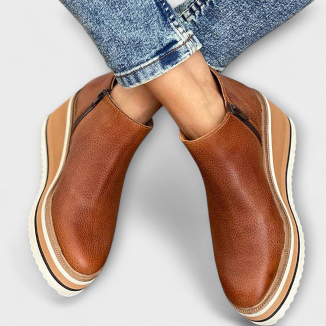 Chelsea ankle boots with side zip and layered platform sole