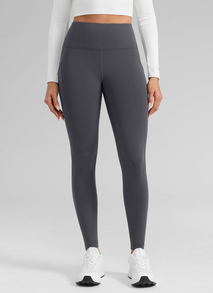 Women's high-waisted ankle-length leggings with side pocket and seam detailing