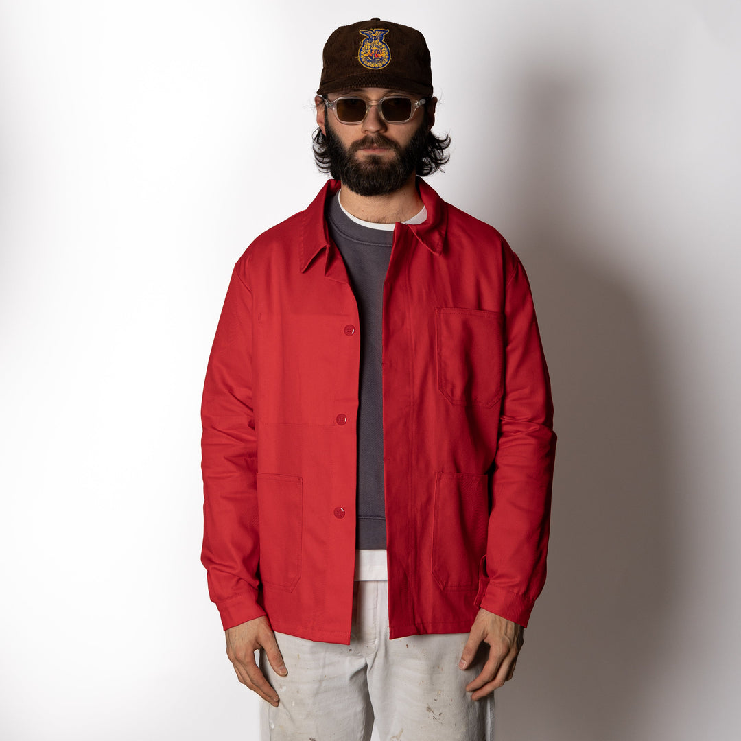 Men's red utility jacket with collar and patch pockets