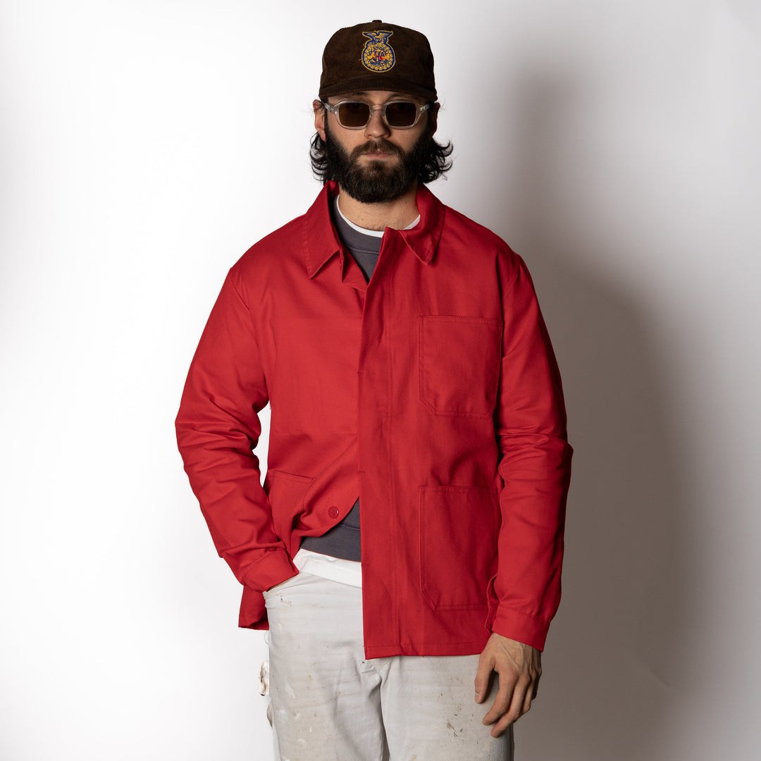 Men's red utility jacket with collar and patch pockets