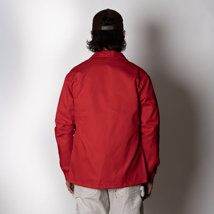 Men's red utility jacket with collar and patch pockets