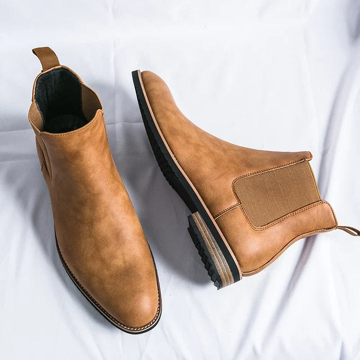 Unisex Chelsea ankle boots with elastic side panels and pull tabs