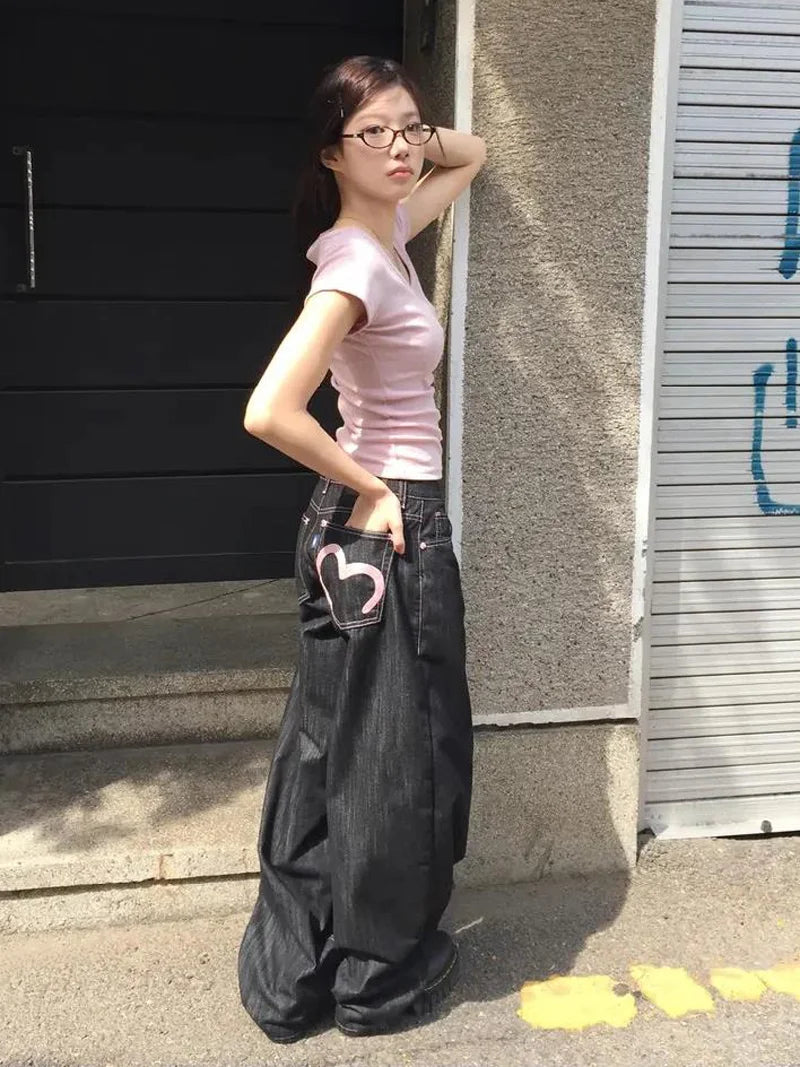 Women's gray wide leg jeans with heart back pocket detail
