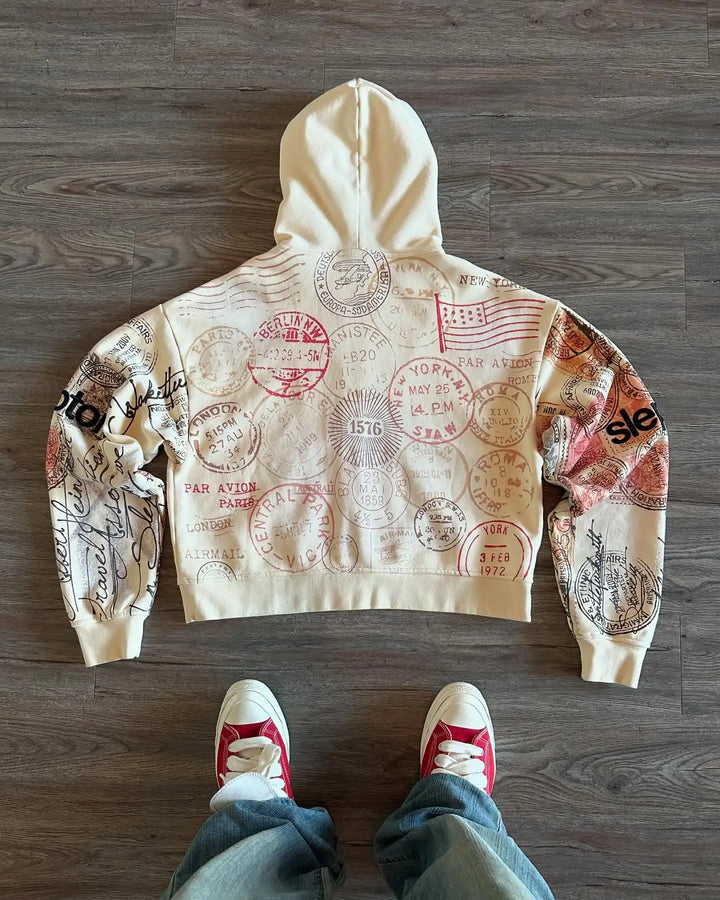 Beige unisex zip-up hoodie with postal graphic print, hood and long sleeves