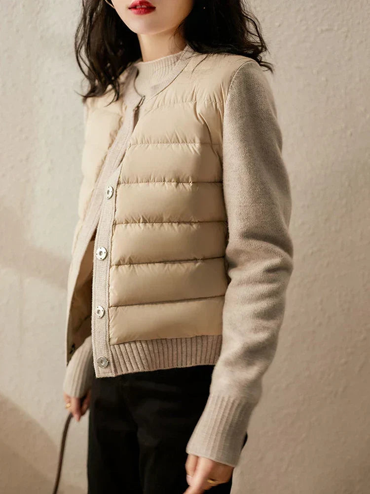 Women's padded panel jacket with long sleeves, round neck and button front
