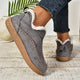 Women's fur-trimmed slip-on ankle boots with round toes and flat textured soles