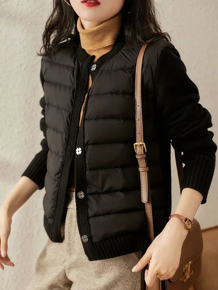 Women's padded panel jacket with long sleeves, round neck and button front