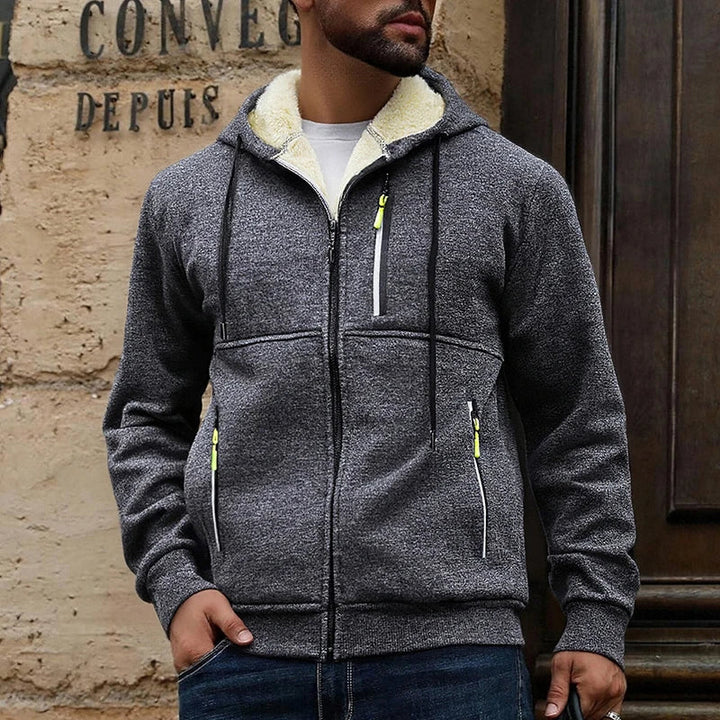 Men's hooded zip jacket with fleece-style lining and zipped pockets