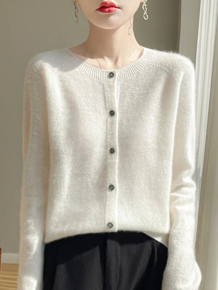 Women's knitted button-front cardigan with round neck and long sleeves