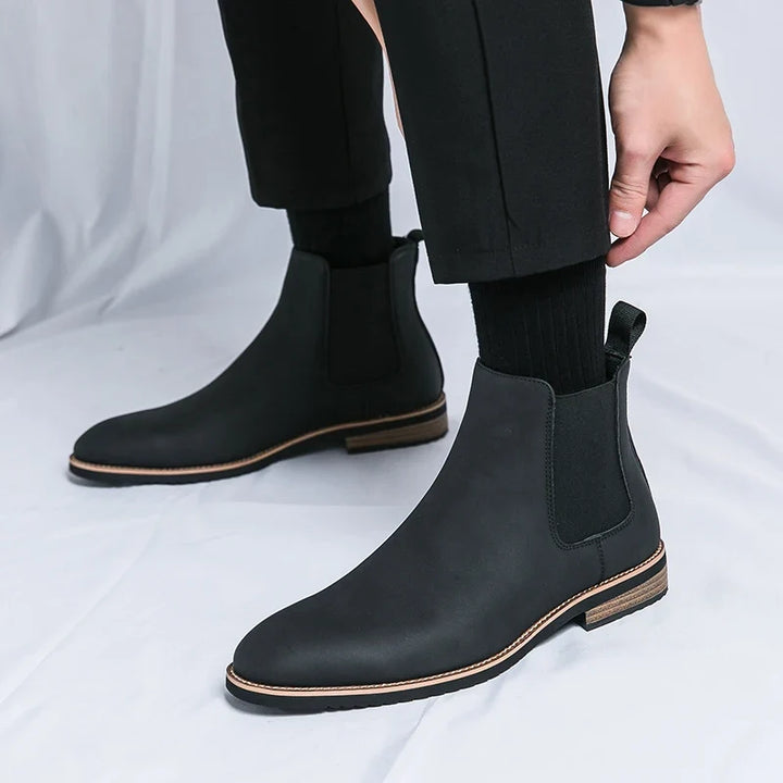 Unisex Chelsea ankle boots with elastic side panels and pull tabs