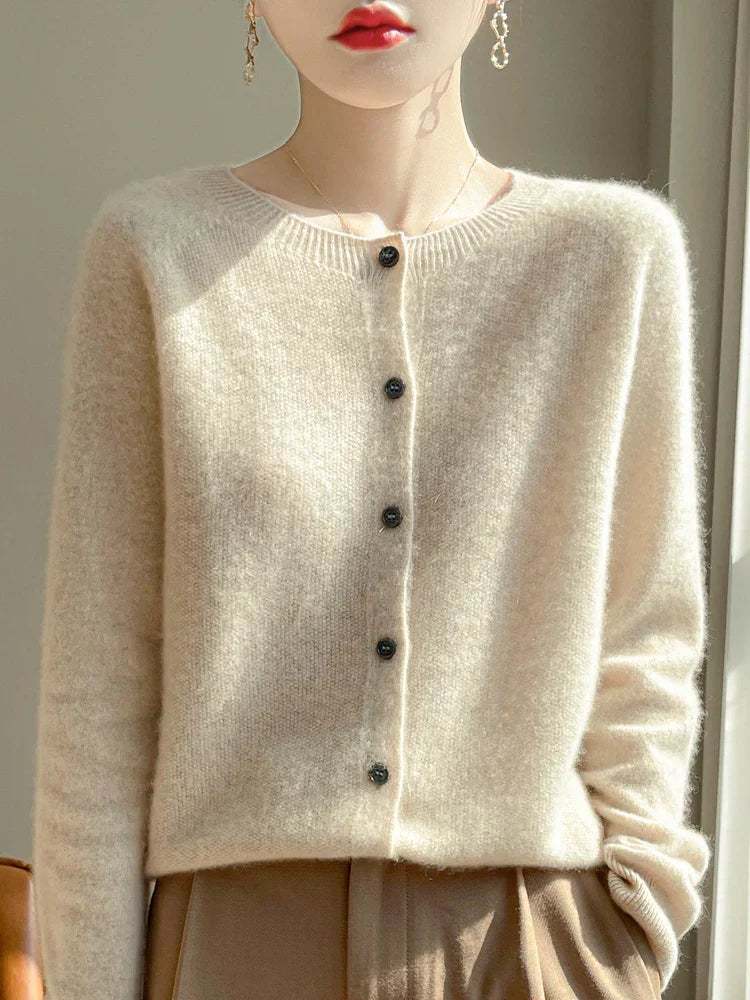 Women's knitted button-front cardigan with round neck and long sleeves