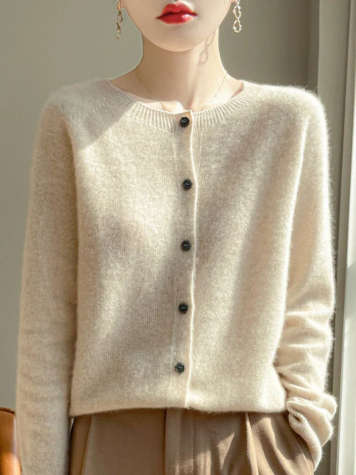 Women's knitted button-front cardigan with round neck and long sleeves