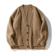 Women's oversized ribbed knit cardigan with V-neck, buttons and front pockets