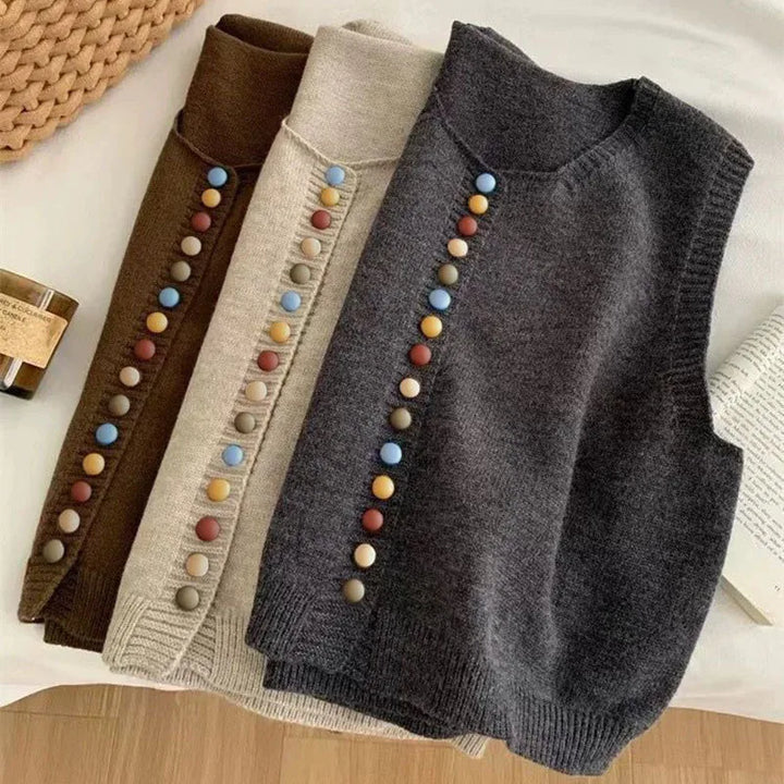 Sleeveless knit vest with round neckline and multicoloured button front
